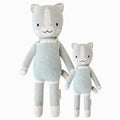 Dylan the kitten in the regular and little sizes, shown from the front. Dylan is wearing a white and mint striped romper.