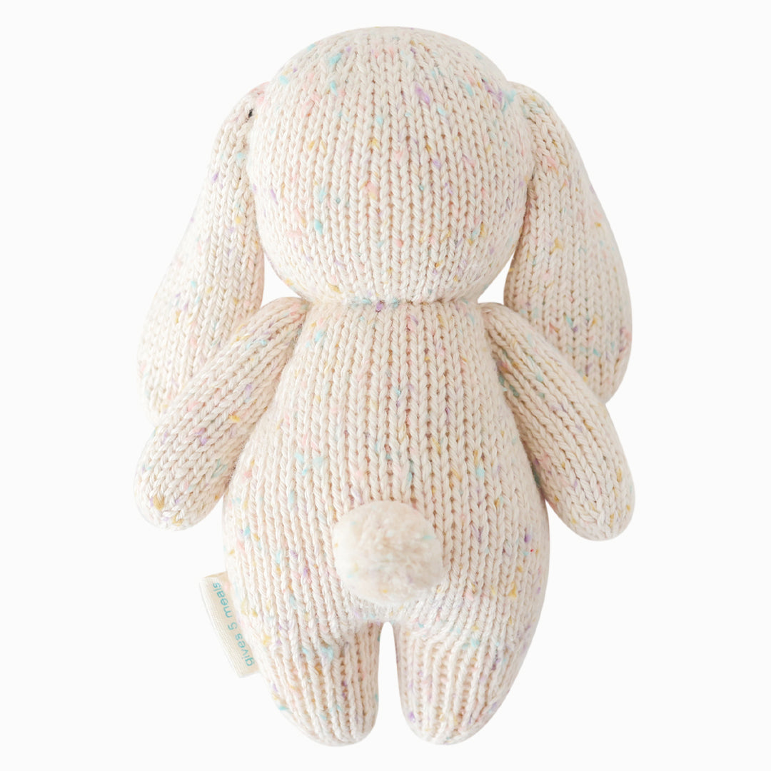 The bunny stuffed animal shown from the back. Baby bunny in confetti has a fluffy, cotton tail.
