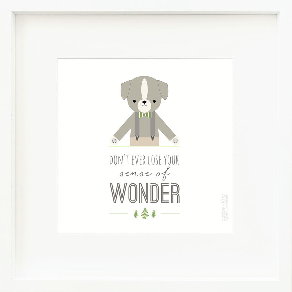 An inspirational print with a graphic of Noah the dog on a white background with the words “Don’t ever lose your sense of wonder” in gray.