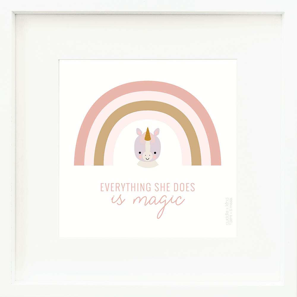 An inspirational print with a graphic of Zoe the unicorn on a white background with a pink and gold rainbow and the words “Everything she does is magic” in pink.