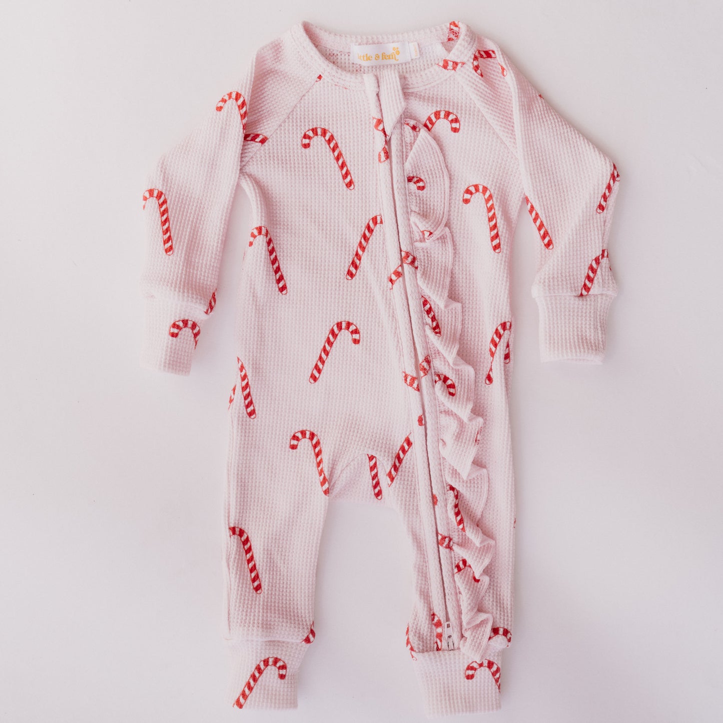 Frill Zip Romper | Pink Candy Cane Waffle