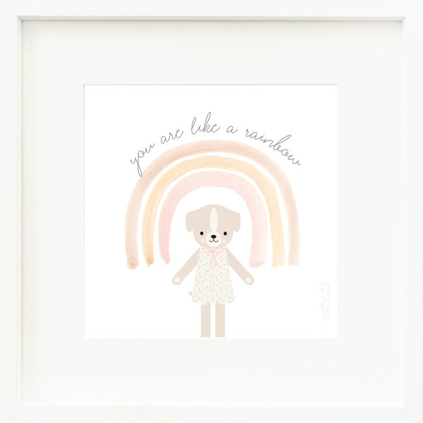 An inspirational print with a graphic of Mia the dog with the words “You are like a rainbow” in gray on a white background with a drawing of a rainbow.