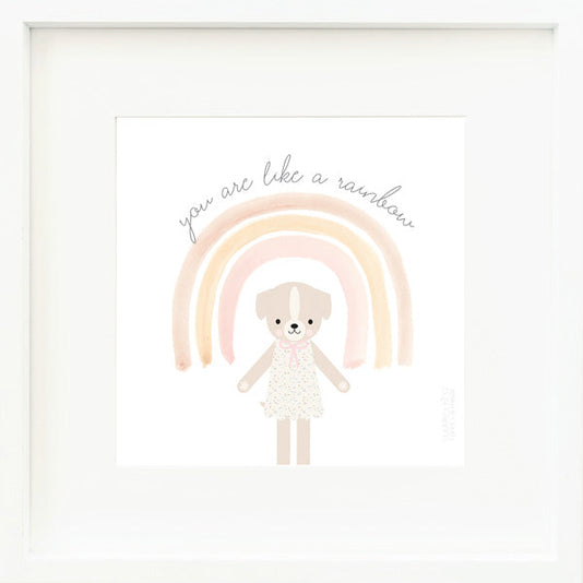 An inspirational print with a graphic of Mia the dog with the words “You are like a rainbow” in gray on a white background with a drawing of a rainbow.