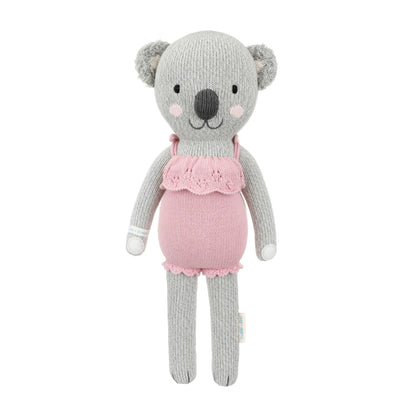 Claire the koala shown from 360°. Claire is wearing a pink romper with ruffles.