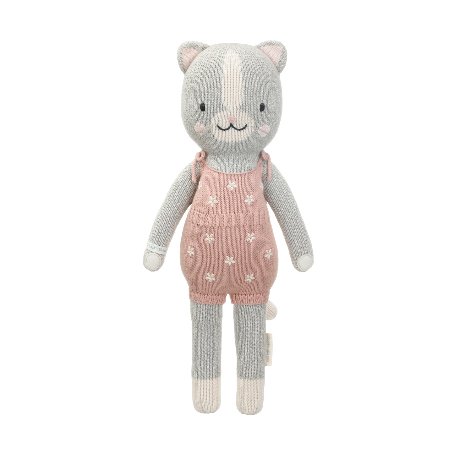 Daisy the kitten shown from 360°. Daisy is wearing a pink romper with daisies embroidered onto it and bows on the shoulders.
