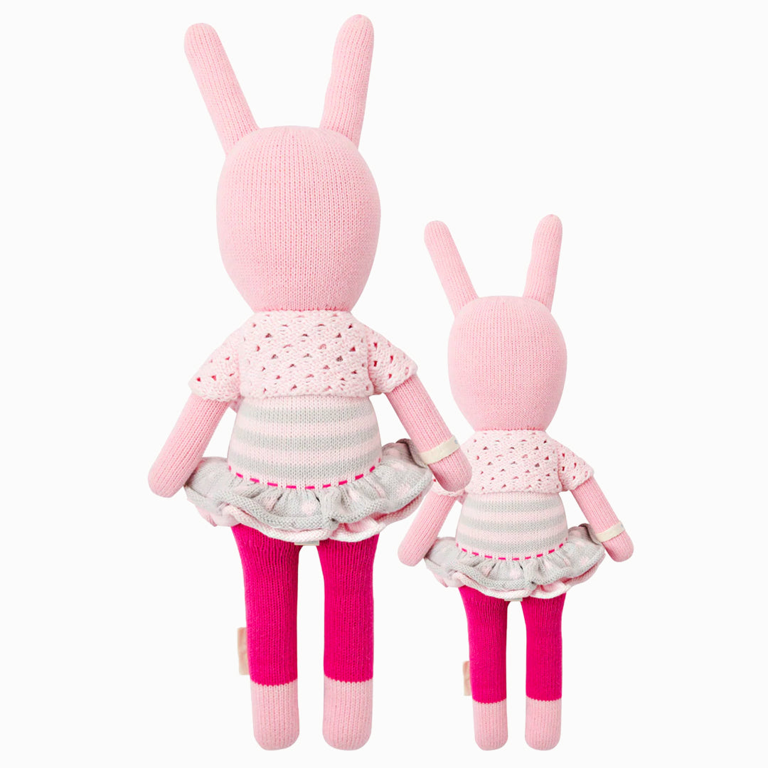 Cuddle and kind doll Chloe the bunny in the regular and little sizes, shown from the back.