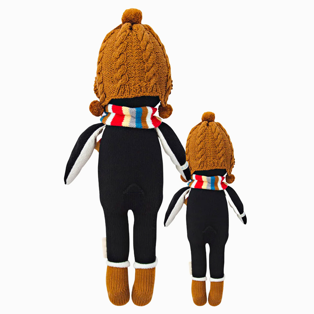 Cuddle and kind doll Everest the penguin in the regular and little sizes, shown from the back.