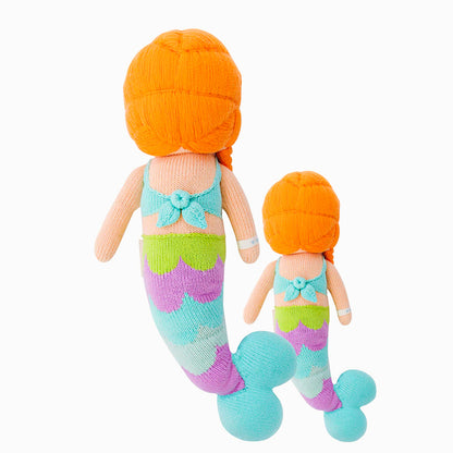 Cuddle and kind doll Isla the mermaid in the regular and little sizes, shown from the back.