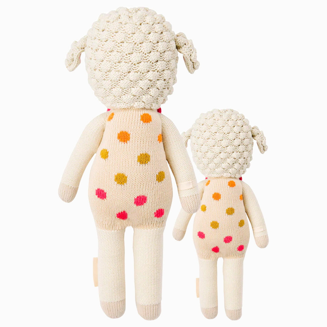 Cuddle and kind doll Lucy the lamb in the regular and little sizes, shown from the back.