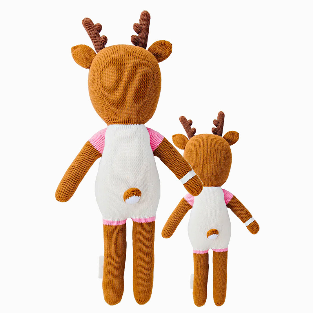 Cuddle and kind doll Willow the deer in the regular and little sizes, shown from the back. Willow’s tail is poking out the back of her romper.