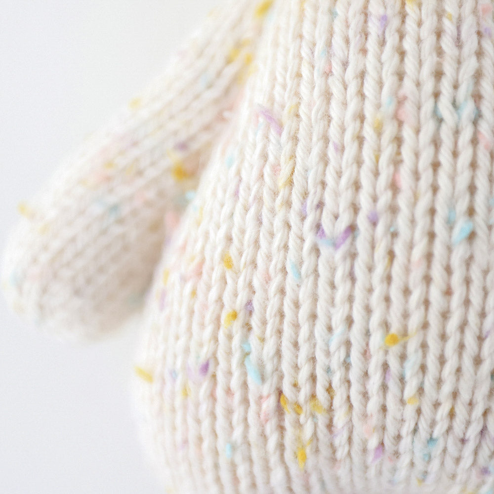 A close up showing the hand-knit details on baby kitten.