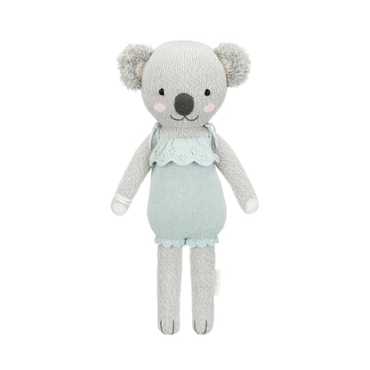 Claire the koala shown from 360°. Claire is wearing a mint green romper with ruffles.
