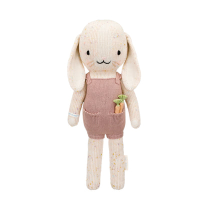 Harper the bunny shown from 360°. Harper is wearing a mauve jumper, with two knitted carrots peeking out of her pocket.