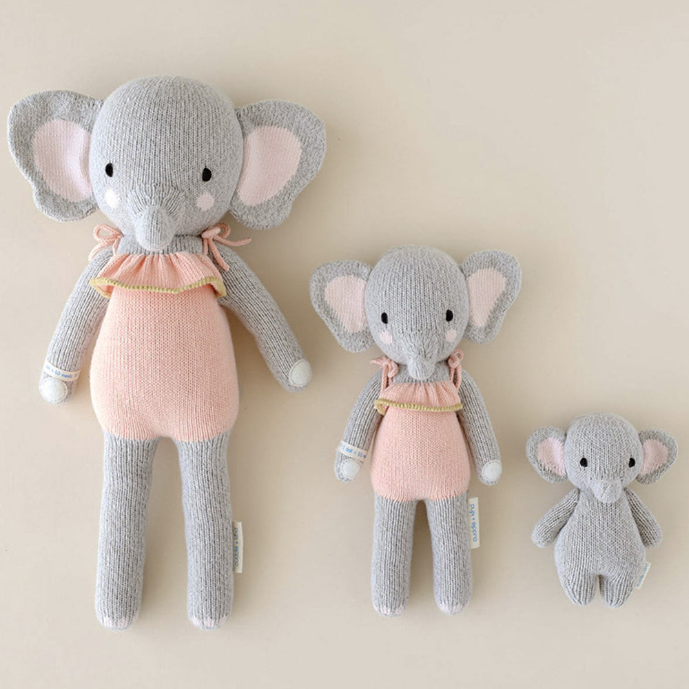 Three hand-knit dolls from cuddle and kind: Eloise the elephant in the regular and little sizes, and baby elephant.