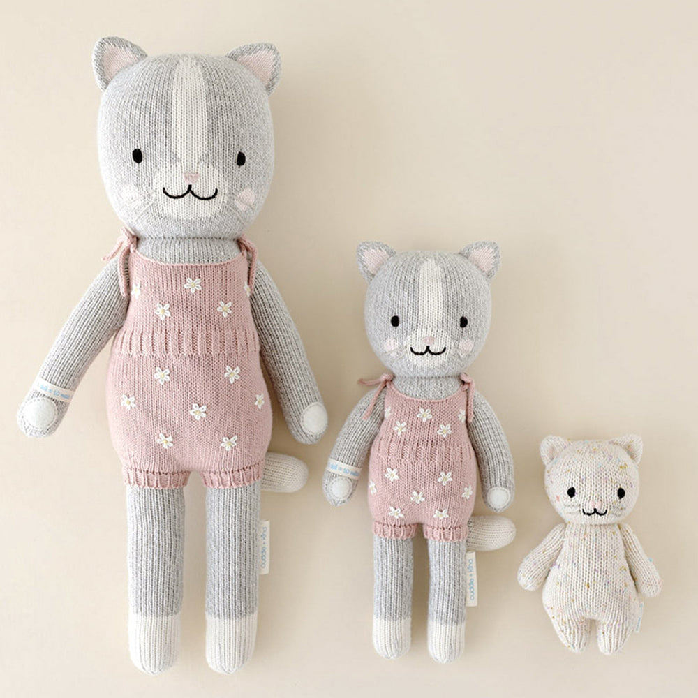 Three hand-knit dolls from cuddle and kind: Daisy the kitten in the regular and little sizes, and baby kitten.