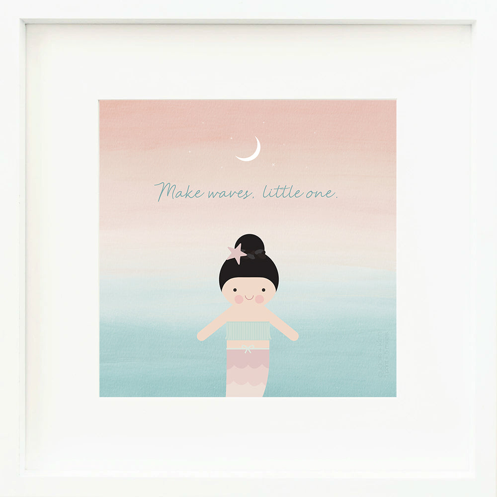 A framed print with a drawing of Luna the mermaid and text that says “Make waves, little one.”