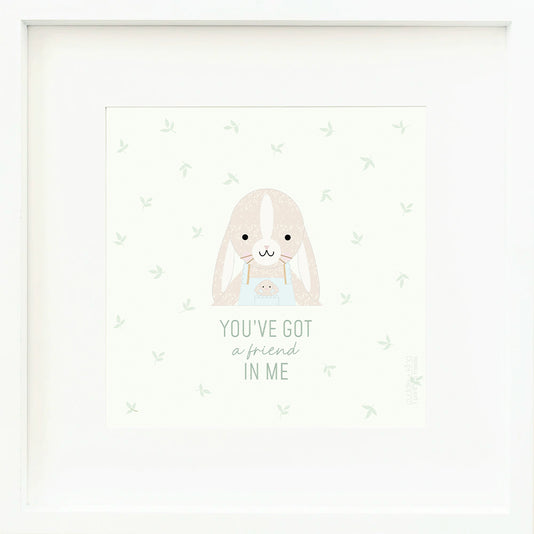 An inspirational print with a graphic of Briar the bunny on a white background with a green leaf print and the words “You’ve got a friend in me” in green text.
