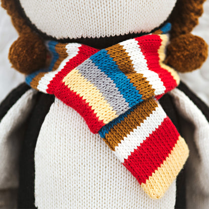 A close-up showing the knitted scarf on Everest the penguin.