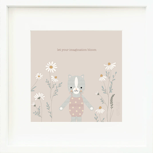 An inspirational print with a graphic of Daisy the kitten next to blooming daisies, with the words “Let your imagination bloom” in brown on a light brown background.