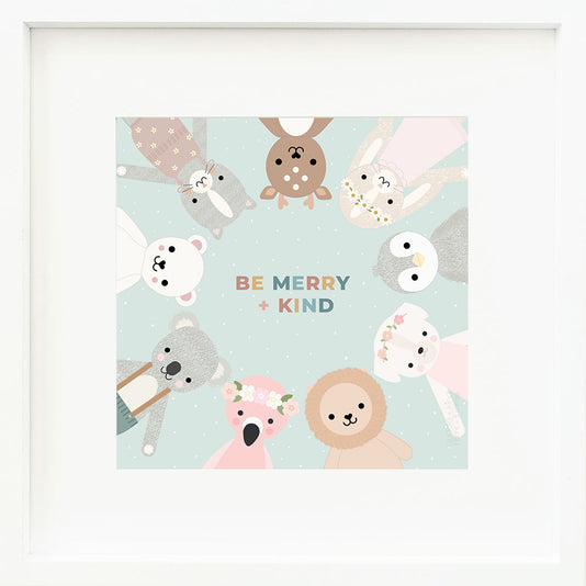 An inspirational print with the multicoloured words “Be merry + kind”. Graphics of cuddle and kind dolls appear in a circle around the text. The background of the print is blue and dotted with little white snowflakes.