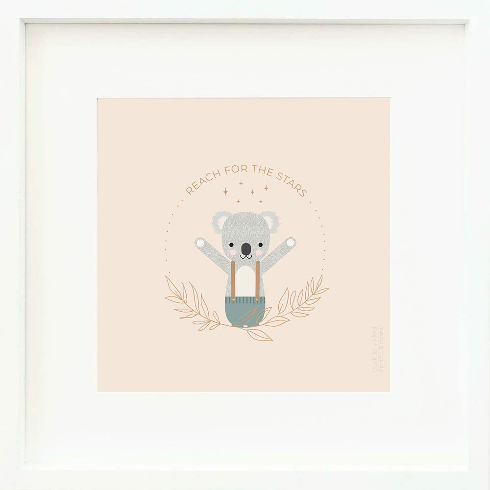 A framed print with a drawing of Quinn the koala and text that says “Reach for the stars.”